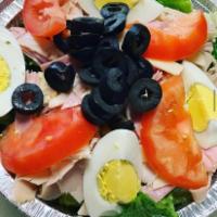 Chef Salad · Ham, turkey, provolone cheese, egg, lettuce, black olives and sliced tomatoes.