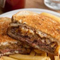 Patty Melt Chicago Style · Served on rye bread with grilled onions and Swiss cheese.