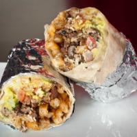Chicago Burrito · Carne asada, pico de gallo, onion rings and cheese, guacamole and sour cream.
