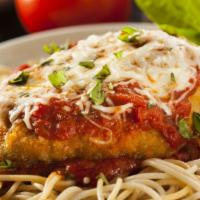 Chicken Parmigiana · Breaded chicken, marinara sauce over a bed of penne pasta topped with mozzarella cheese.