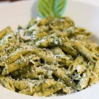 Penne Pesto · Penne pasta sauteed with fresh garlic in an olive oil pesto sauce.