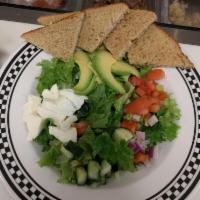 Awesome Salad · Butter lettuce, fresh mozzarella, avocado, tomato and onion.