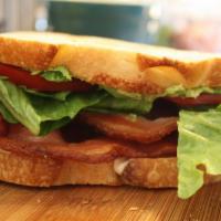 BLT with Avocado Sandwich · Bacon, lettuce and tomato sandwich with avocado.