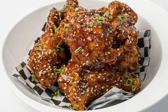Sweet soy and Ginger party wings · Double fried party wings tossed in sweet soy and ginger glaze. 