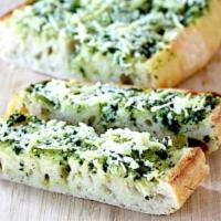 Pane con Aglio · Garlic bread with olive oil, herb, and Parmesan cheese.
