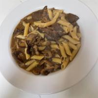 Penne alla Funghi · Porcini, portobello and shiitake mushrooms sauce.
