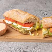 Avocado Sandwich · Ciabatta Bread, Avocado spread, hardboiled egg, tomato and Romaine Lettuce. 