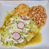 Enchiladas · 3 corn tortillas choice of meat served with green salsa, lettuce, cotija cheese, sour cream,...