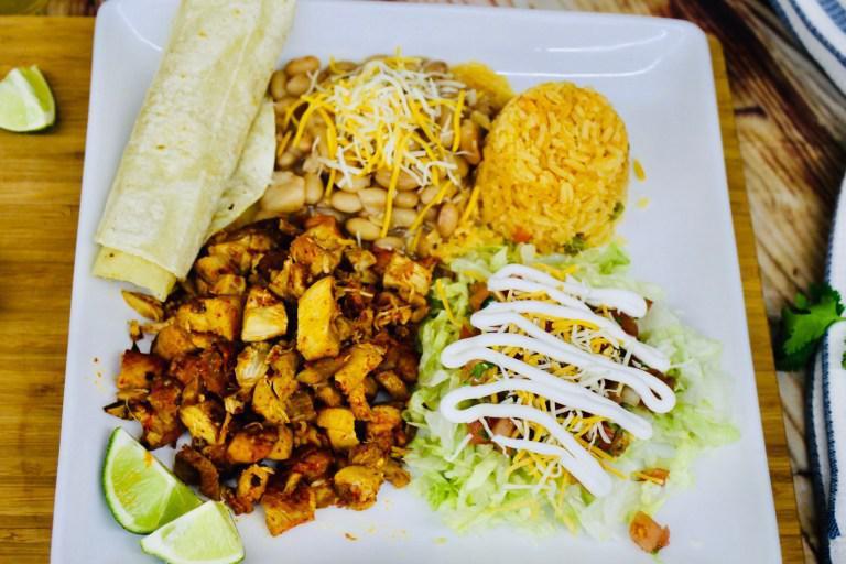 Combo Mix Plate · Spanish rice, pinto beans, choice of meat, served with lettuce, pico de gallo, sour cream, cheese, and 5 corn tortilla shells.