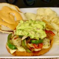 Hermanos Locos Burger · Fresh meat patty, pepper jack cheese, fajita mix, chipotle salsa, and avocado salsa with pic...