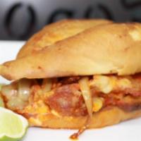 Buffalo Chicken Sandwich · Grilled chicken, sauteed onions, Buffalo sauce, pepper jack cheese, and chipotle sauce on a ...