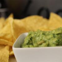 Chips and Guac or salsa · Bag of corn chips and choice of house salsa.