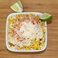 Esquites · Corn in a cup with lime juice, mayo, Cotija cheese, and chili powder.
