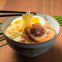 Hell Boy Ramen · Tonkotsu base with house spicy garlic sauce. Spicy.


Instructions to have our ramen better:...