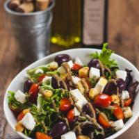 Pomodorini Salad · Cherry tomatoes, mozzarella, almonds, croutons, mixed greens, black olives and Italian dress...