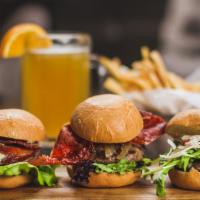 Bambini Trio Burger · 3 in 1 mini burgers. 1 classic, 1 porcini, 1 Italian with arugula, tomato, Parmesan shaves a...