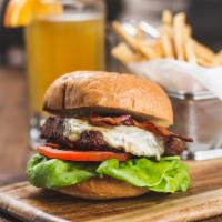 Classic Hamburger · 8 oz. prime Angus beef, taleggio cheese, lettuce, tomato, red onions, bacon and french fries.