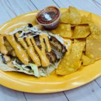 San Lucas Fish Taco · Our famous grilled fish taco served in soft corn tortillas with cabbage mix and chipotle sau...