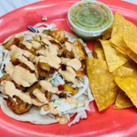 San Lucas Shrimp Taco · Our famous grilled shrimp taco served in a soft corn tortilla with cabbage, chipotle sauce, ...
