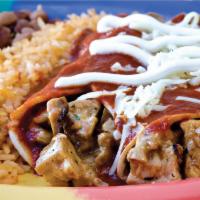 Enchiladas Combo · Served with 2 sides and a regular soda.