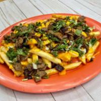 Carne Asada Fries · French fries, melted cheddar cheese, cilantro and onion.