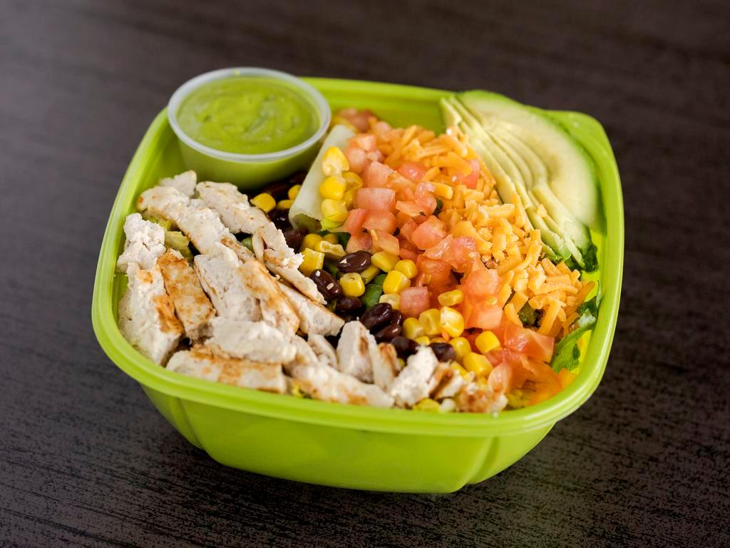 Mexican Salad · Chicken, lettuce, tomato, corn, black beans, cheddar cheese, avocado and cilantro dressing.