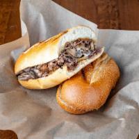 Philly Cheese Steak · Thinly Sliced Steak, Sautéed Onions & Mushrooms, Provolone Cheese, NY Style Sub Bread.