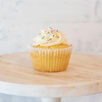 Gourmet Vanilla Cupcake · Includes classic buttercream and sprinkles.