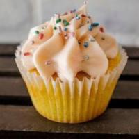 Gourmet Guava Cupcake · Includes specialty buttercream and sprinkles with Guava filling.