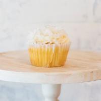 Gourmet Piña Colada Cupcake · Pineapple Cake with Shredded Coconut Includes classic buttercream and sprinkles.