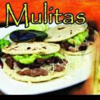Mulitas  · Tortillas filled with meat and cheese.