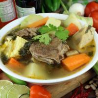 Caldo de res · A Mexican beef soup typically served with cabbage, potatoes, corn and cilantro
