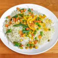 Basmati Rice · Rice cooked in meat broth with wholes spice seasoning served with garnishments and side of m...
