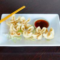 6 Crab Cheese Wontons · Crispy wontons filled with a creamy mix of crab meat, green onion and a hint of dijon mustard.