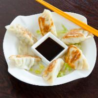 6 Steamed Dumplings · Delightful combination of chicken, ginger, scallions,with a hint of white pepper handmade da...
