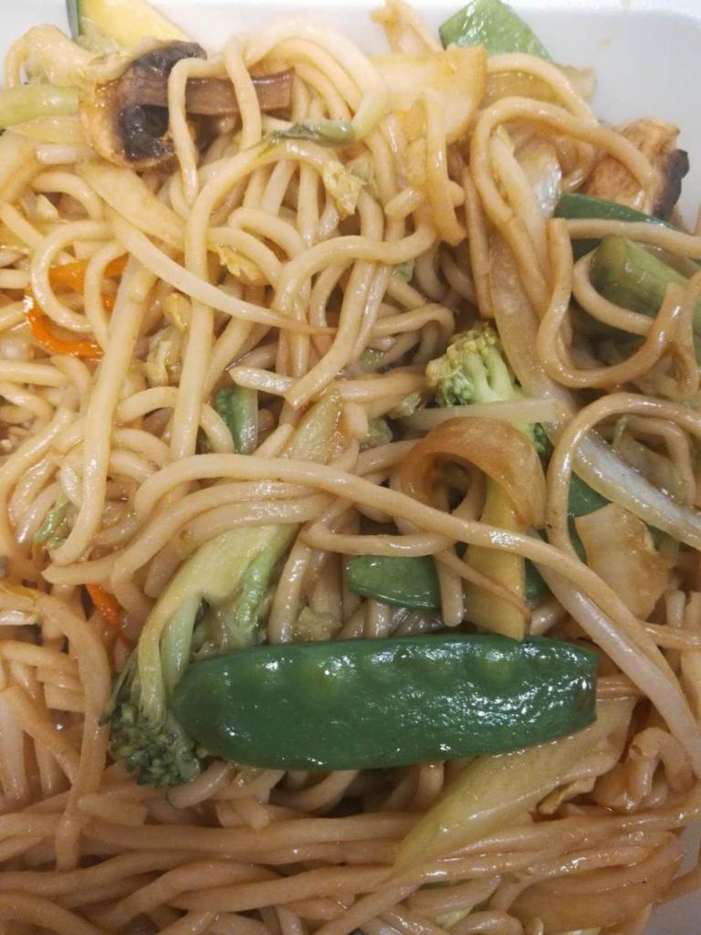 1. Vegetable Lo Mein · Classic Chinese noodles with carrots, bean sprouts, yellow and green onions in a light brown sauce with a hint of sesame oil.