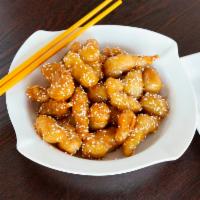 9. Sesame Chicken Dinner · ceWhite meat. Lightly battered and sautéed  in our spicy sesame sauce