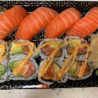  Salmon Lover · Raw. 4 pieces of salmon sushi with  spicy salmon avocado roll.