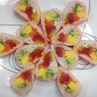  Sweet Girl Maki · Tuna, salmon, tobiko, mango, avocado and crunch inari wrap soy bean paper.