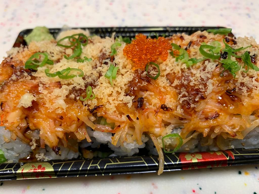 Volcano Maki · Eel, crabmeat avocado, topped with baked spicy seafood crispy crunch&scallion
