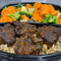 Lamb Chop Meal · 4 chops over a bed of rice, and your choice of mix vegetables, broccoli, or sauteed  potatoe...