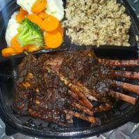 Rack of Lamb · Full and 1/2 rack of Lamb served with long grain wild rice or brown rice, and mixed vegetabl...