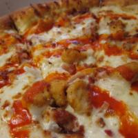 Buffalo Chicken Pizza · Ranch sauce, Buffalo chicken, red onions and mozzarella cheese.