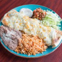 Classic Burrito · Flour tortilla.  Choice of beans, ground beef or chicken.  With melted cheese, lettuce, pico...