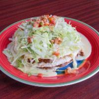 Mexican Sandwich · 3 levels of grilled flour tortillas, beans, rice, cheese, lettuce, pico de gallo, choice of ...