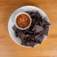 Chips and Salsa · Blue corn chips, and house-made tomato-jalapeno salsa.