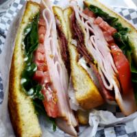 Turkey Club Sand-Wish Meal Lunch · Roasted turkey cold-cut and bacon layered on toasted sliced bread with flavor aioli sauce, r...