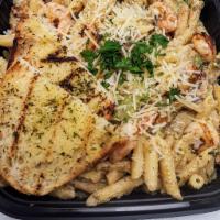 Signature Jerk Chicken Pasta · Jerk spice marinated, Flame-grilled chicken 