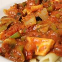Chicken Cacciatore Pasta Dinner · Chicken breast sauteed with peppers, onions, mushrooms in our homemade marinara sauce over a...