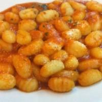 Potato Gnocchi · Served with house salad and garlic bread.